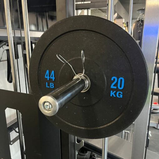 Flecked bumper plate 20KG on a bar