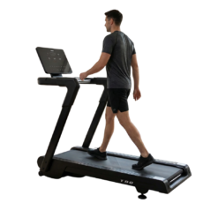 man on Bolt T90 Treadmill with white background