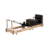 Folding Oak Pilates Reformer black with white background